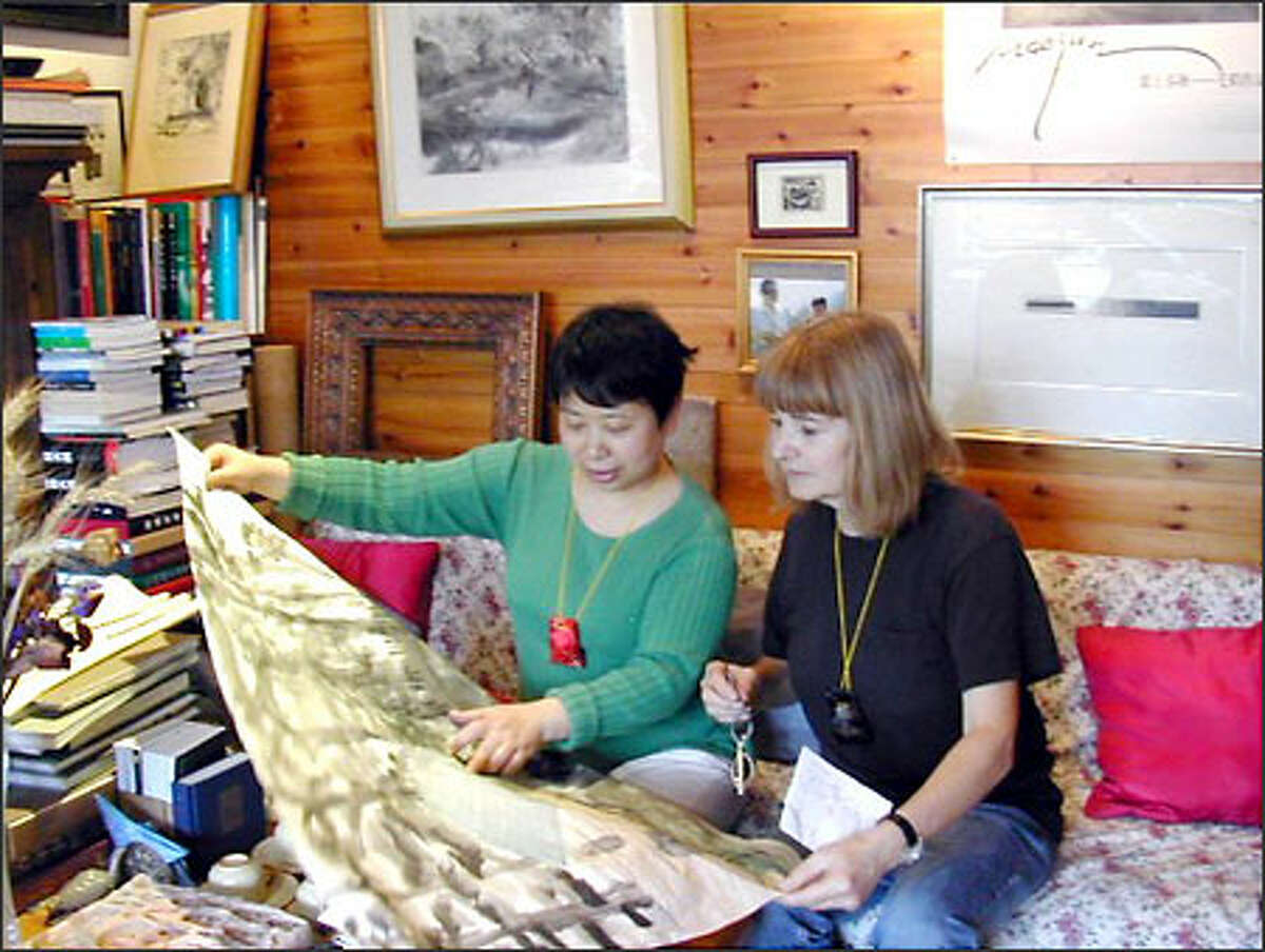 Michelle Van Slyke continues her lessons in traditional Chinese painting with Yang Chun Hua, at Yang's home. (Courtesy of Michelle Van Slyke)