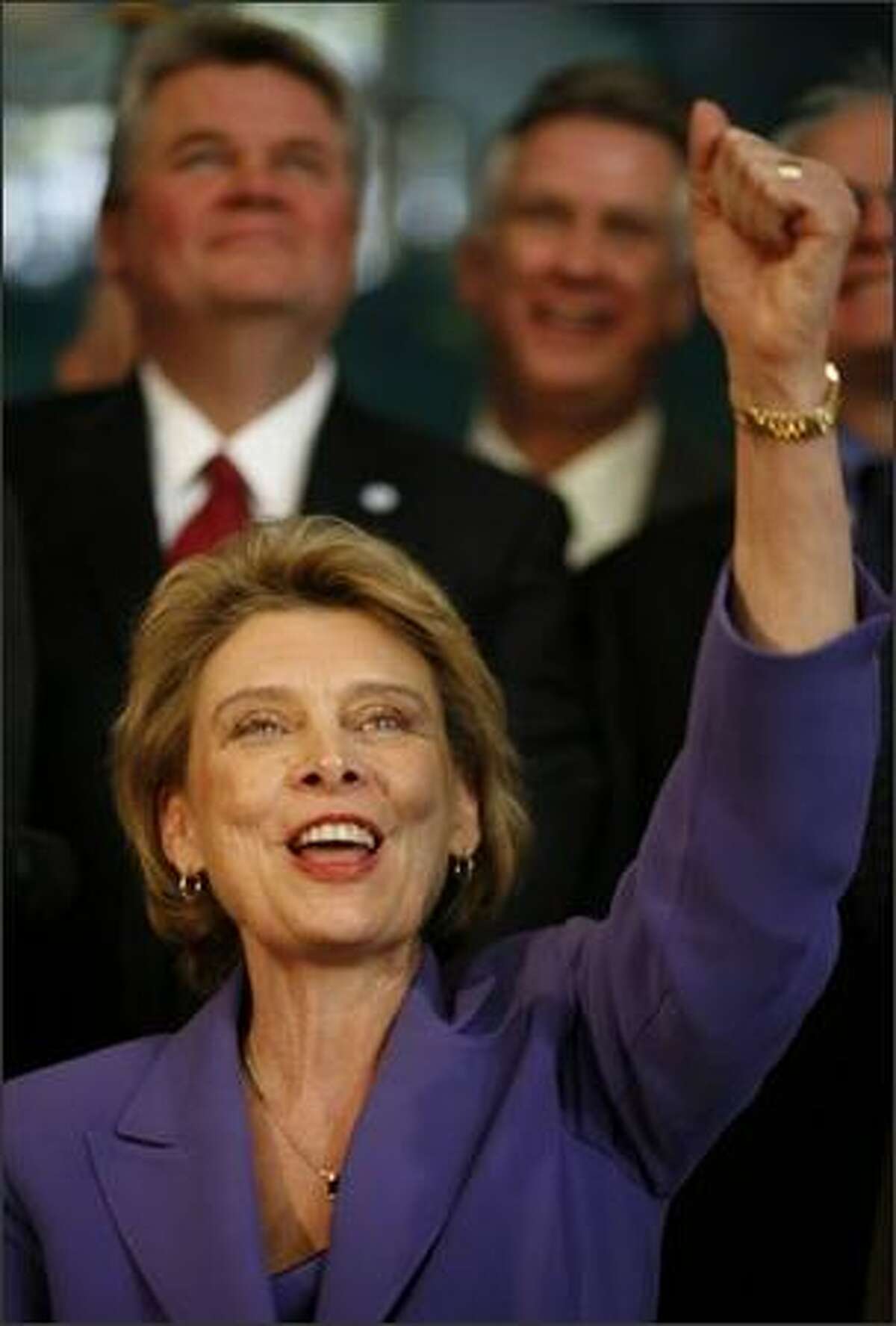 Gov. Chris Gregoire celebrates after signing legislation to replace the Alaskan Way Viaduct on Tuesday.