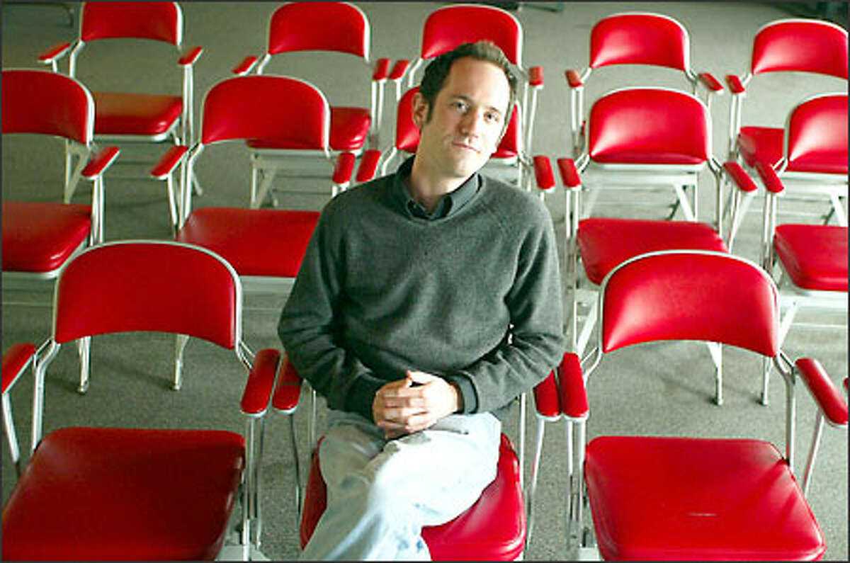 Director Tim Boyd hopes to fill these seats at the 911 Media Arts Center on Wednesday with people each willing to adopt a minute of his new film "Uniforms" after a screening.