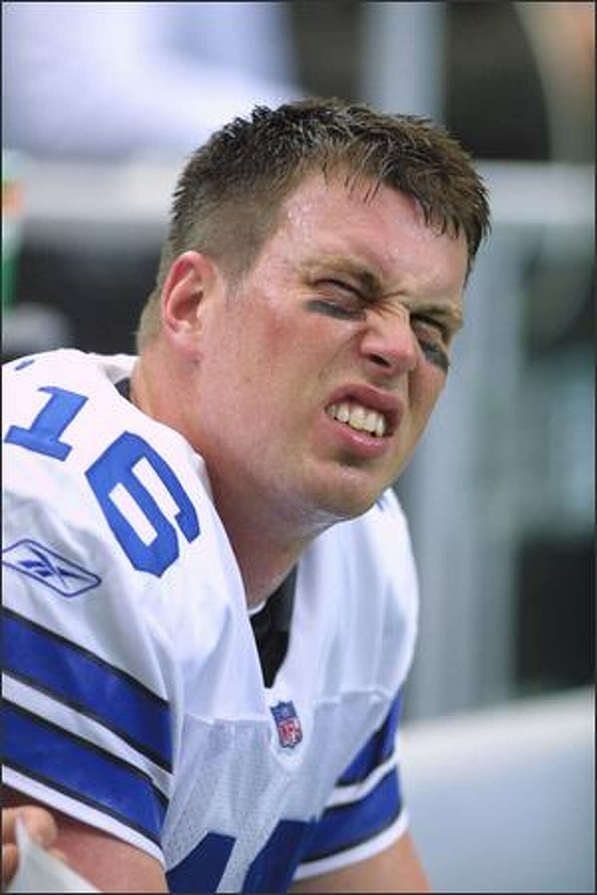 Quarterback Ryan Leaf of the Dallas Cowboys looks up at the scoreboard as his team loses to the Atlanta Falcons in this November 2001 file photo.