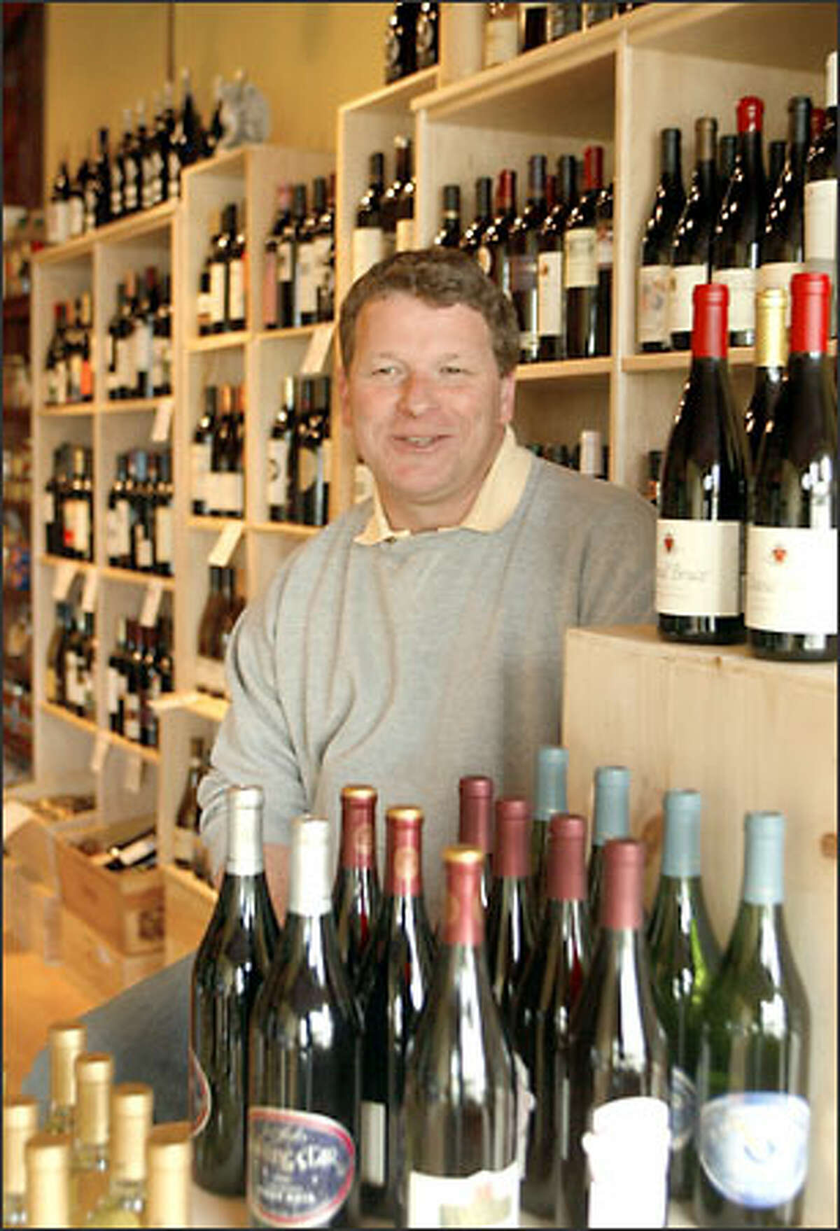 John Mabbott opened The Wine Shop on Twenty Fourth at 5903 24th Ave. N.W. near two bakeries.