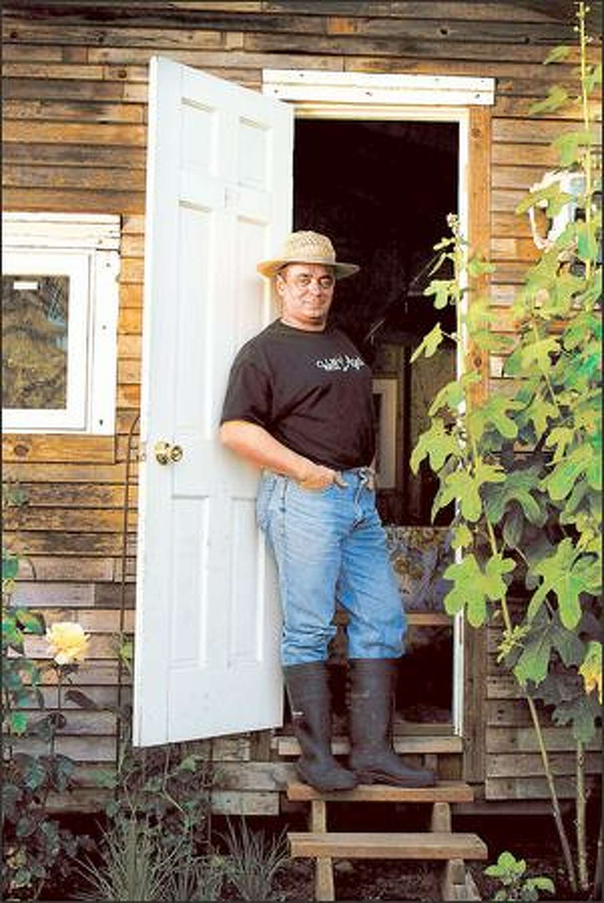 Thierry Rautureau in his home garden, where he and his wife grow vegetables and herbs, some of which are used at his nearby Madison Valley restaurant.