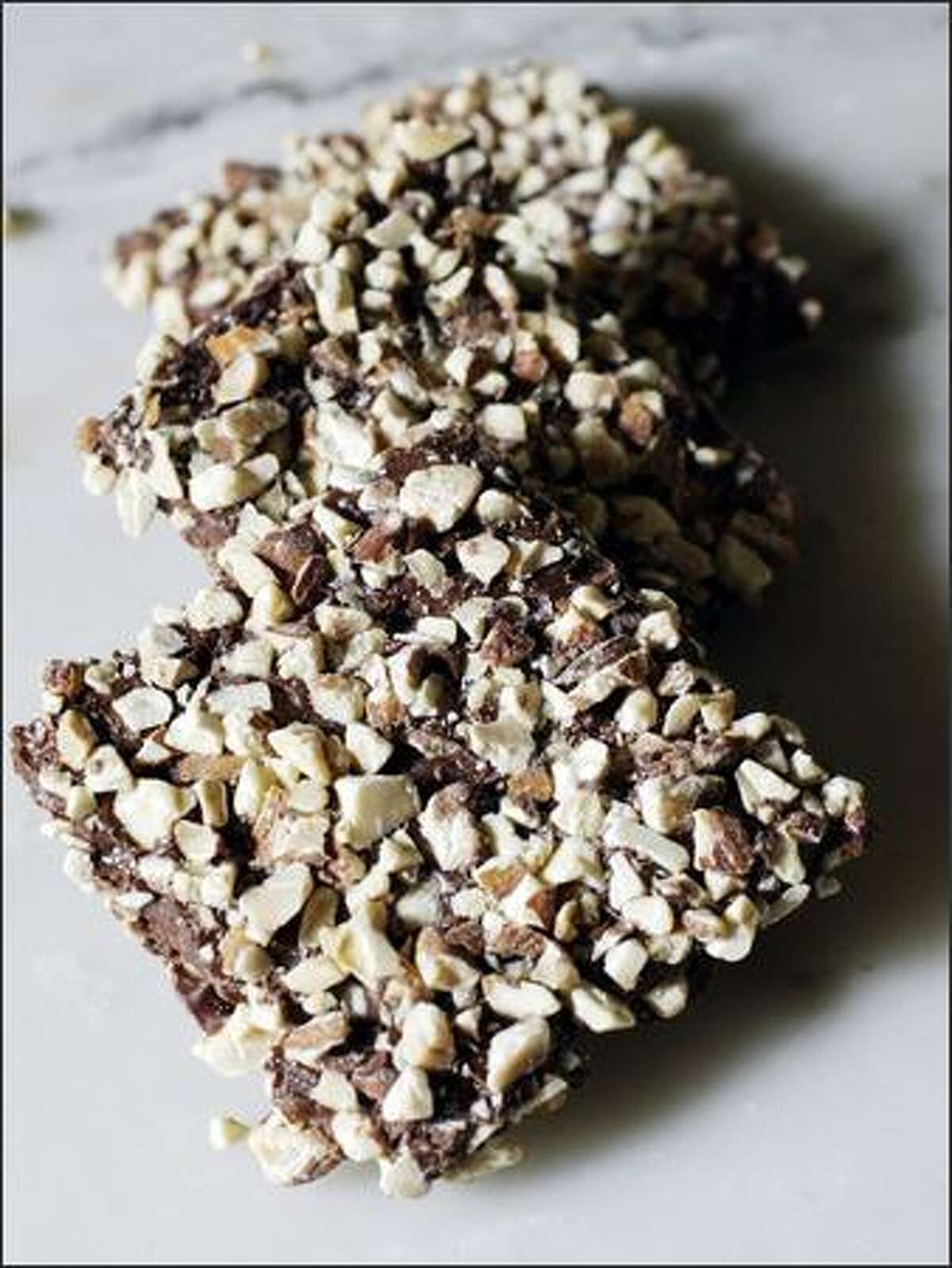 English toffee Cost: $23.90 per pound Where: Rocky Mountain Chocolate Factory, 1419 First Ave.; 206-262-9581 Why: One bite of the chocolate- and nut-coated toffee will cause your eyes to roll back in pleasure. It’s rich but not overpowering.