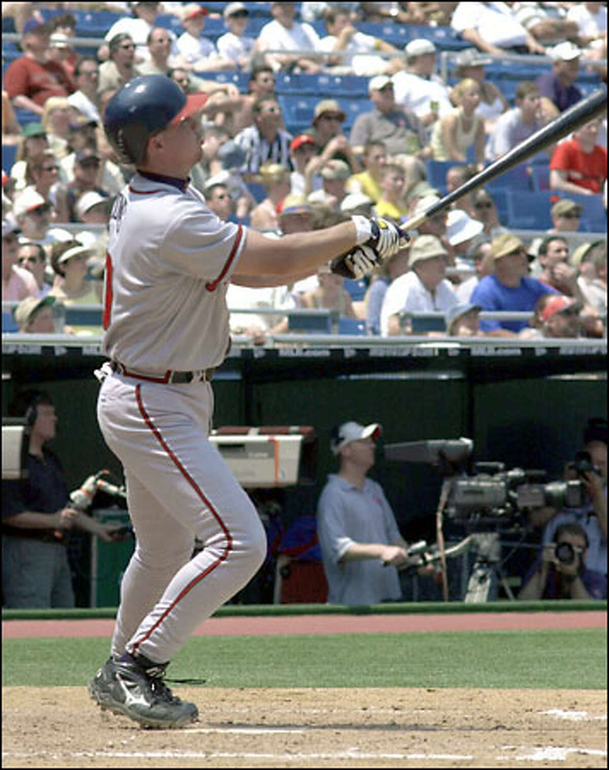 Braves third baseman Chipper Jones watches his second-inning home run against the Phillies.