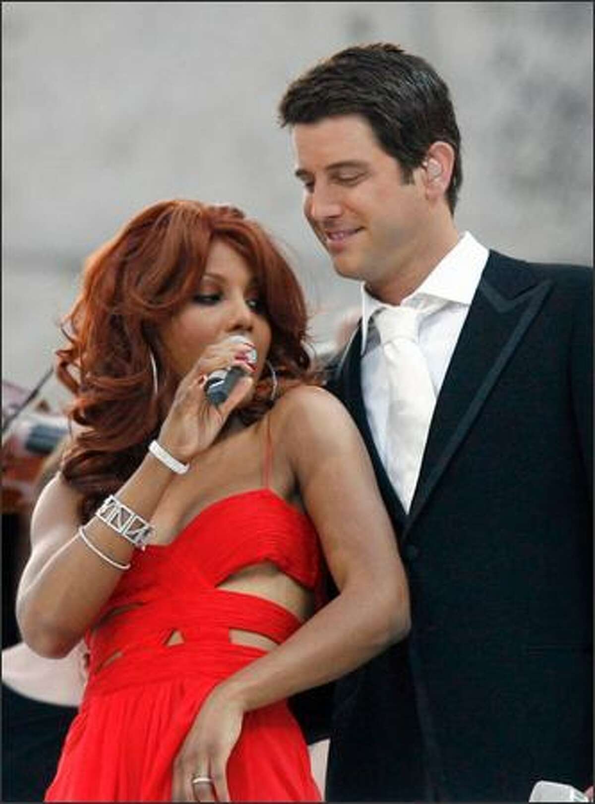 Looks as if Toni Braxton came perilously close to a wardrobe malfunction while singing in Berlin with Sebastian Izambard of the group Il Divo, during the closing ceremonies of soccer's World Cup on Sunday, but Europeans don't tend to get as panicky as Americans when a breast pops out of a garment.