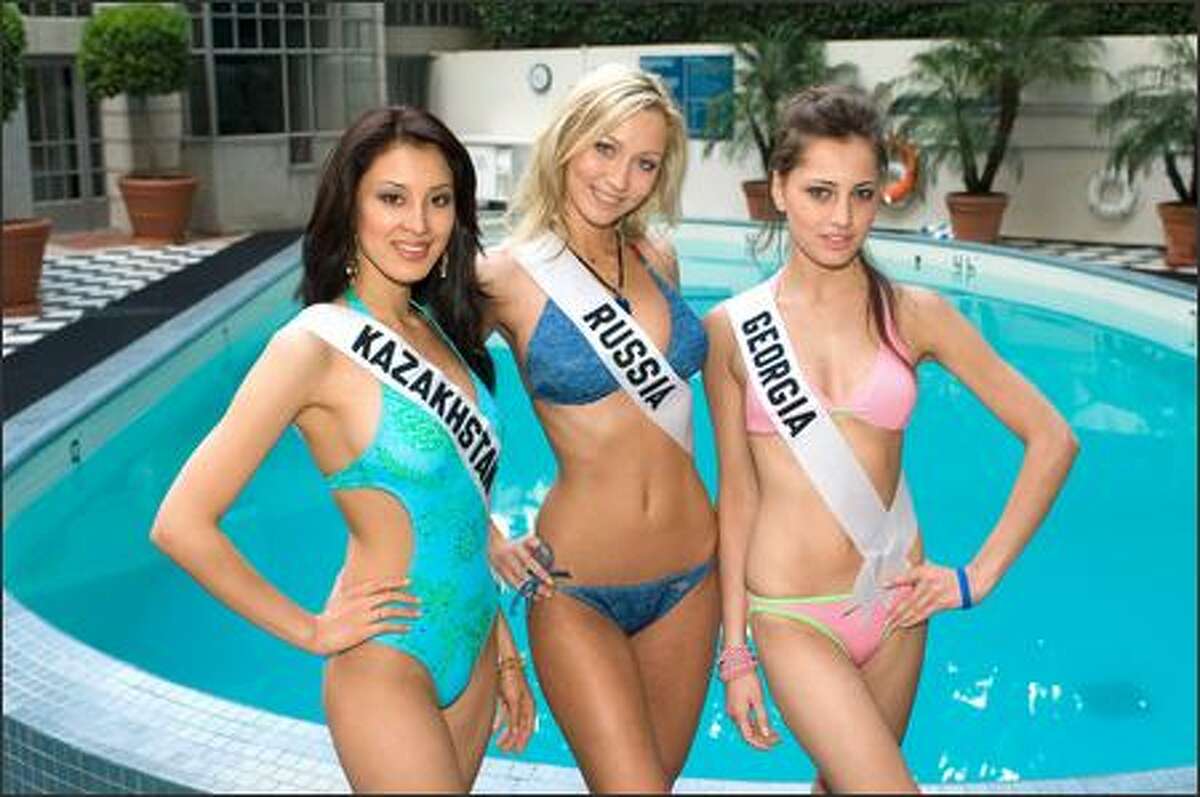 These hot babes are Miss Universe contestants posing in Los Angeles before the July 23 event. All want to work for world peace. Don't beauty contestants always say they want world peace? No. Some want to help animals. We stand corrected. Left to right, Dina Nuraliyeva, Anna Litvinova and Ekaterine Buadze.