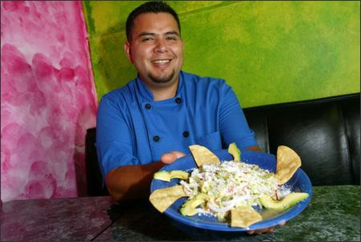 Juan Montiel wears many hats -- owner, chef, cashier and dishwasher-- at El Quetzal, the Beacon Hill restaurant he and his wife, Helena, run. The El Nopal cactus salad ($7.75) is one of 12 vegetarian dishes.