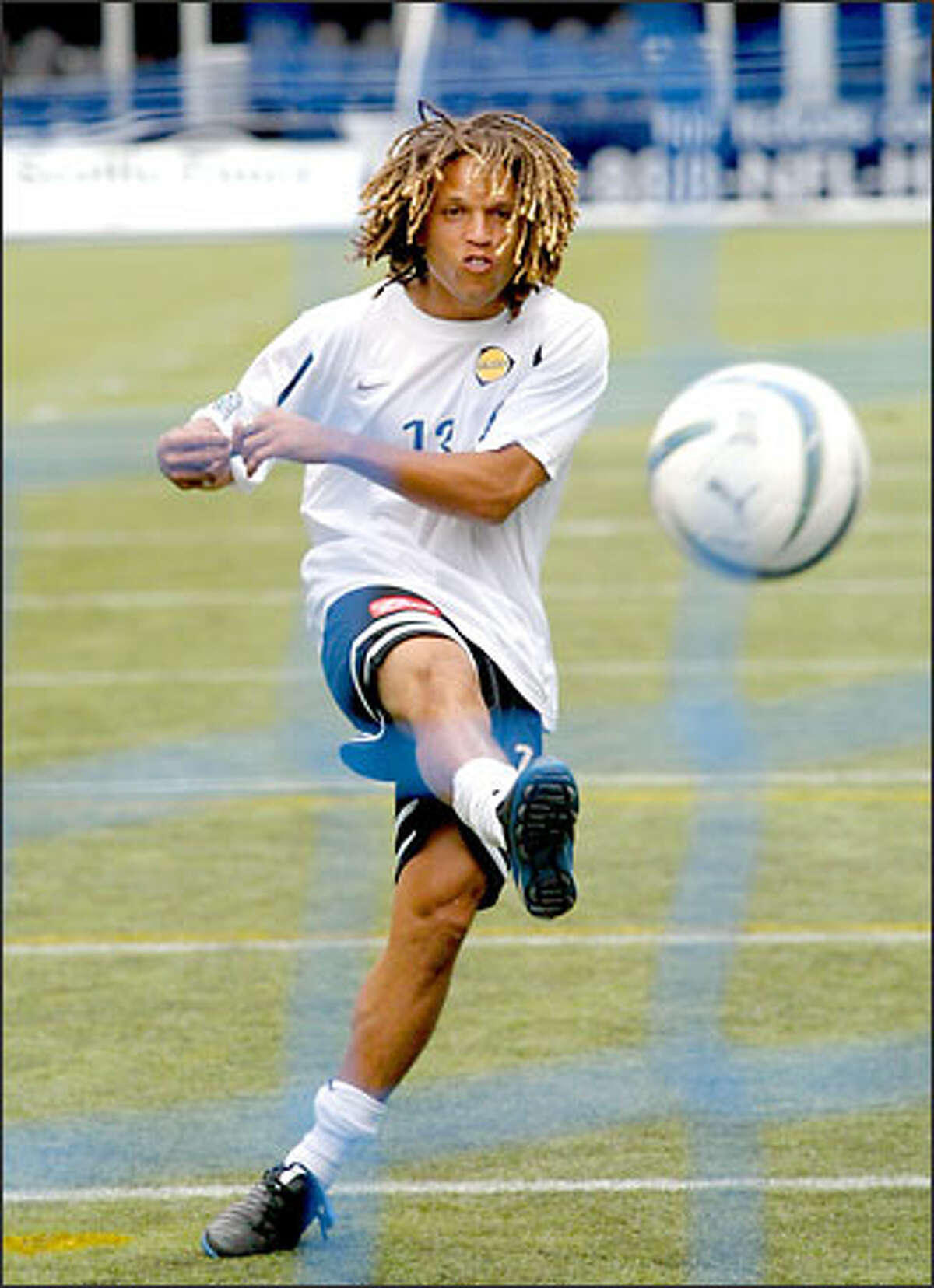 Los Angeles Galaxy star Cobi Jones takes a shot during practice at Seahawks Stadium in preparation for tonight's U.S. Open Cup match.