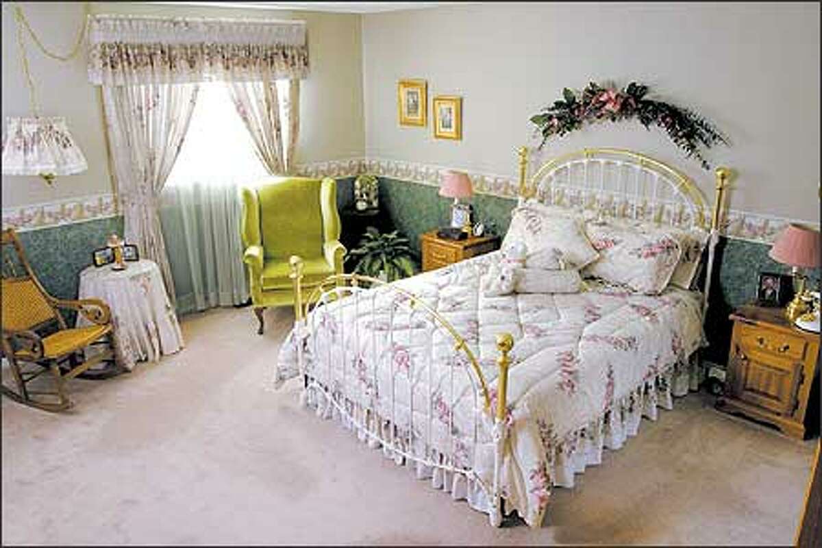 Before: This frilly master bedroom needed a gender-neutral update.