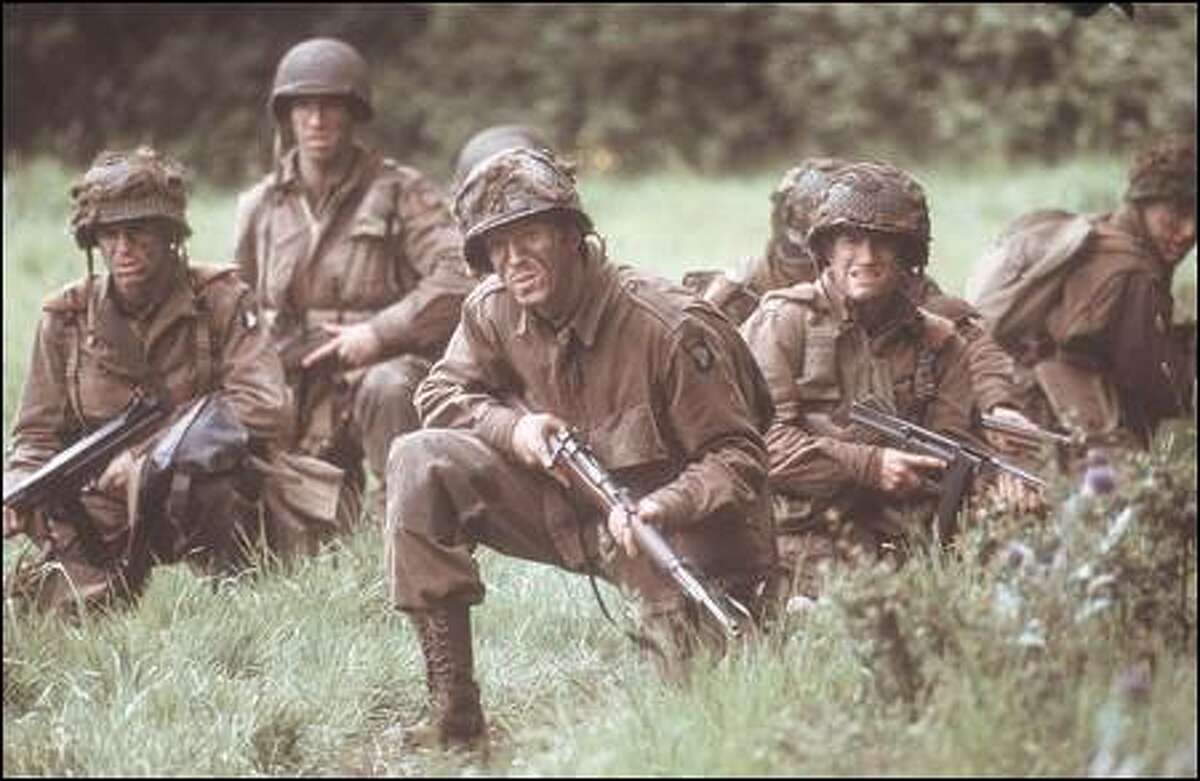 HBO's "Band of Brothers," with Damian Lewis and Frank John Hughes, in the foreground, realistically examines the human capacity for sacrifice and endurance.
