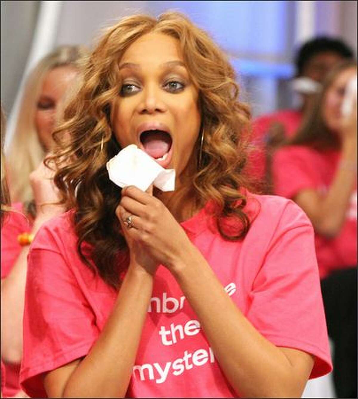 Model turned talk-show hostess Tyra Banks encourages her studio audience to reveal their natural beauty by wiping off all their makeup. On the premiere of her eponymous show, which airs today, Banks reveals that even professional models like her get retouched in photos.