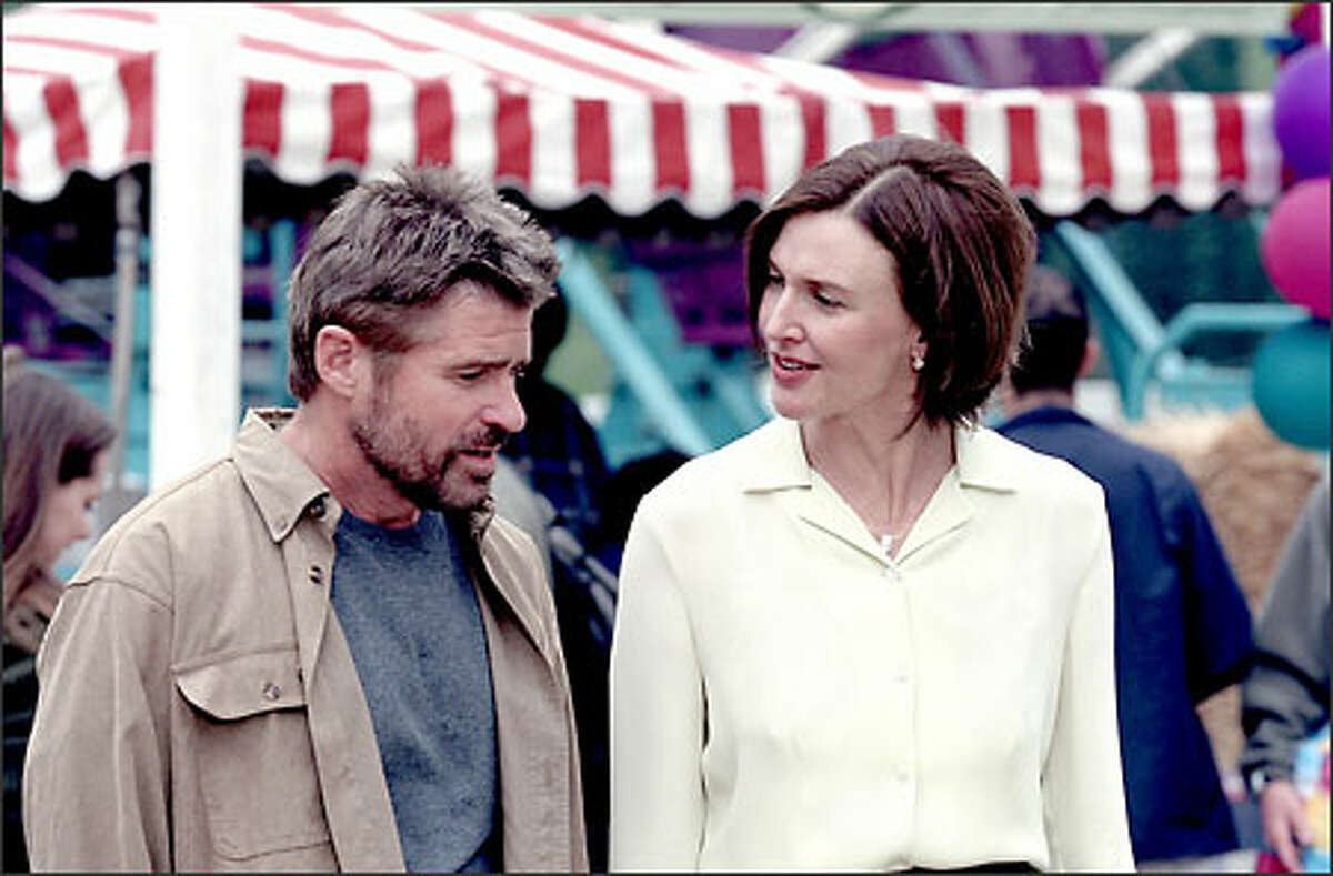 Dr. Andrew Brown (Treat Williams) shares a light moment with his wife, Julia (Brenda Strong), in the new WB drama series "Everwood."