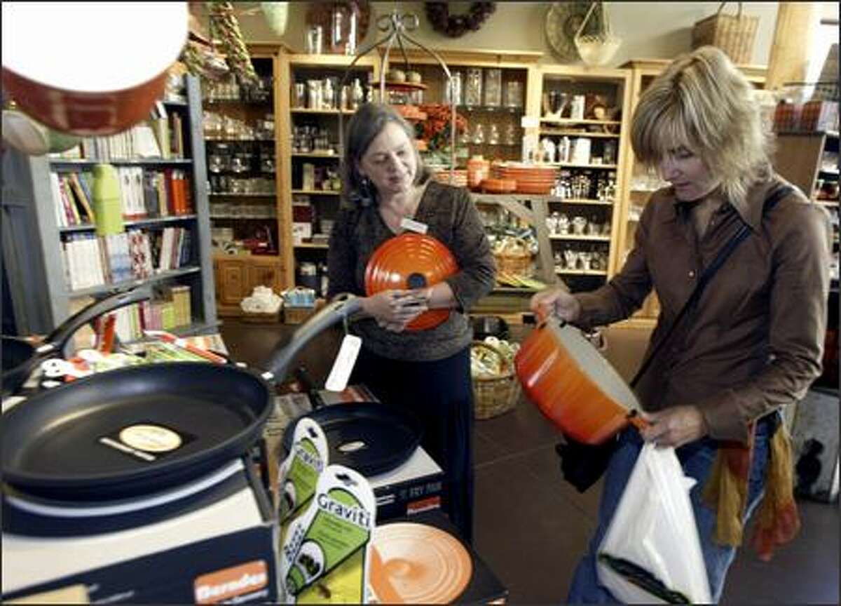 Mrs. Cook's has always been a University Village store that lets customers try before they buy. But after 42 years they're turning off the griddle. Click through to see University Village through the years. 