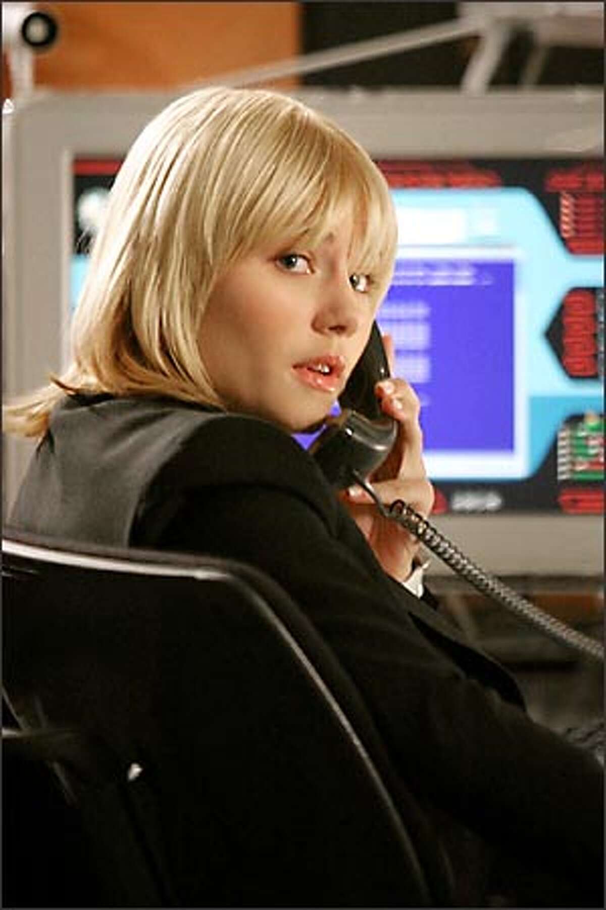 Talk about implausible plot twists: accident-prone Kim Bauer (Elisha Cuthbert) now works for CTU.