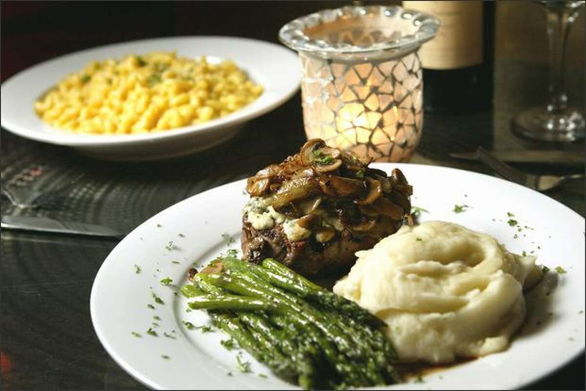 The beef tenderloin (and macaroni and cheese in the background) stand out.