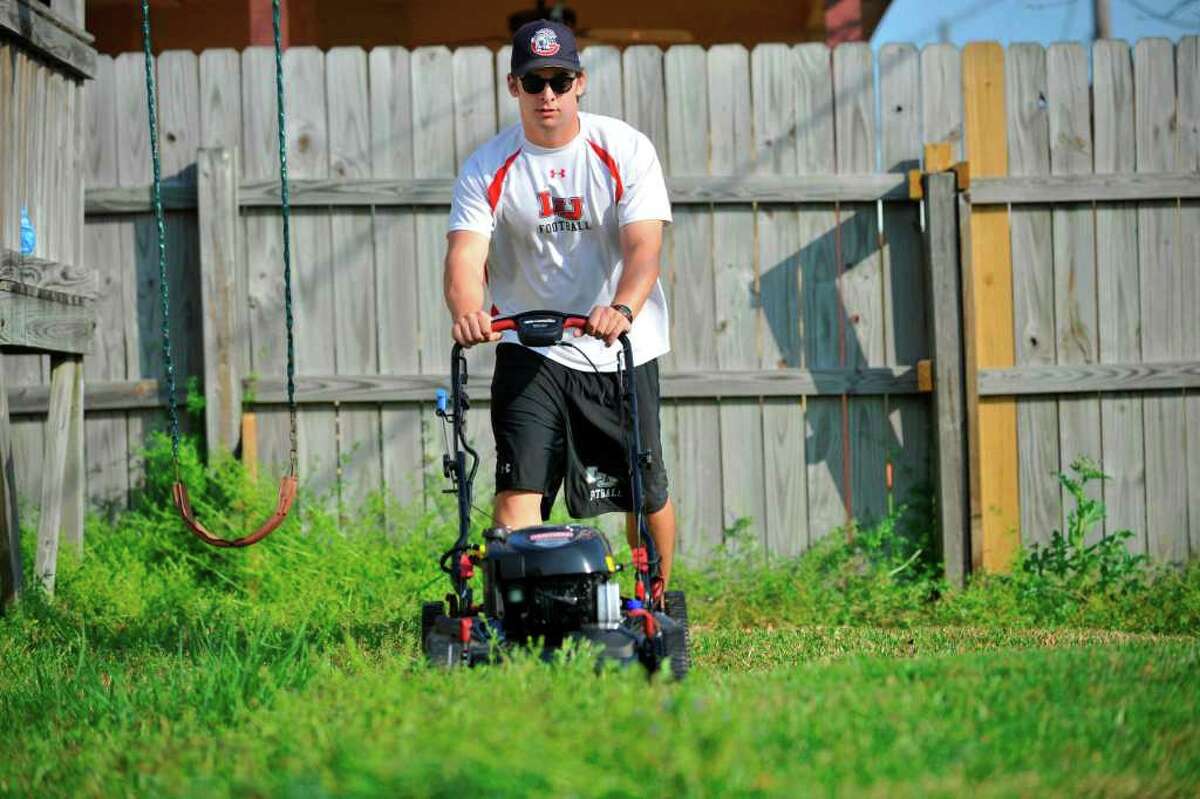 Mow money Lamar football player Harrison Tatum cuts grass for extra cash
