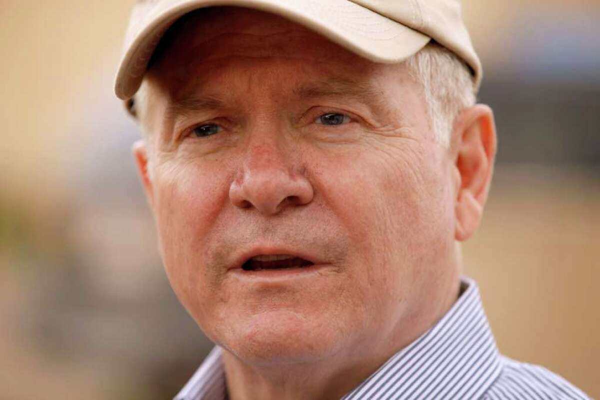 Defense Secretary Robert Gates talks with reporters after meeting with soldiers from the 4th Advise and Assist Brigade, 1st Calvalry Division out of Fort Hood, Texas, Friday, April 8, 2011, at Camp Marez in Mosul, Iraq. (AP Photo/Chip Somodevilla, Pool)