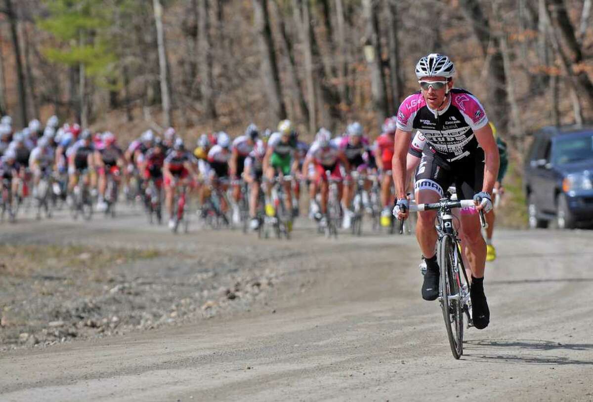 Professional riders work hard to ascend Juniper Swamp Road, a dirt road, during the Tour of the Battenkill 2011 bike race, on Sunday April 10, 2011 in Shushan, NY. (Philip Kamrass/ Times Union )