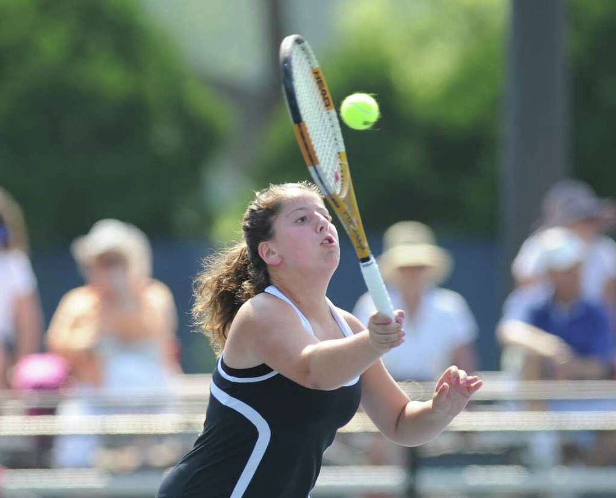 Haley Wolf of Fairfield Warde High School hits during her match against Danielle Cepelewicz of Greenwich High School at Yale University, Friday, June 4, 2010, during the Girls State Class L Championship. Fairfield Warde beat GHS to win the Championship.l