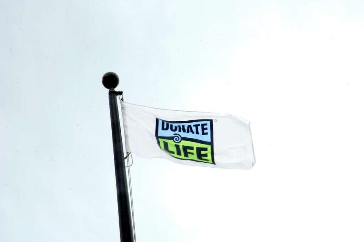 First Selectman Peter Tesei raised a "Donate Life" flag at Greenwich Town Hall to commemorate "National Donate Life Month," on Tuesday, April 12, 2011.