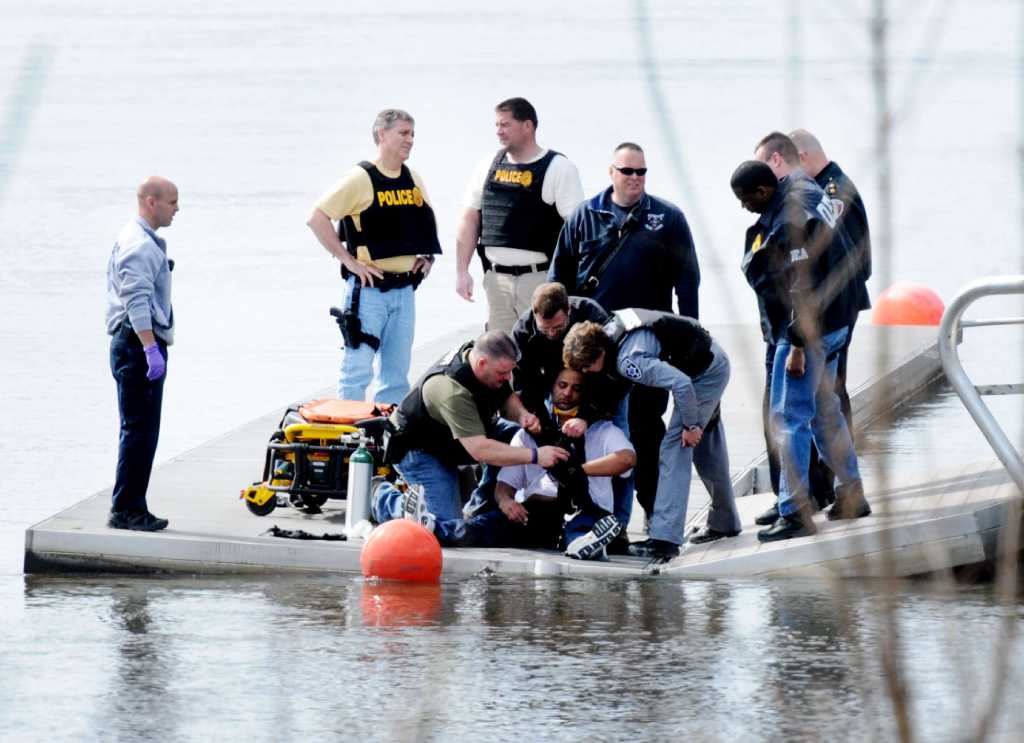 Man jumps from bridge after chase