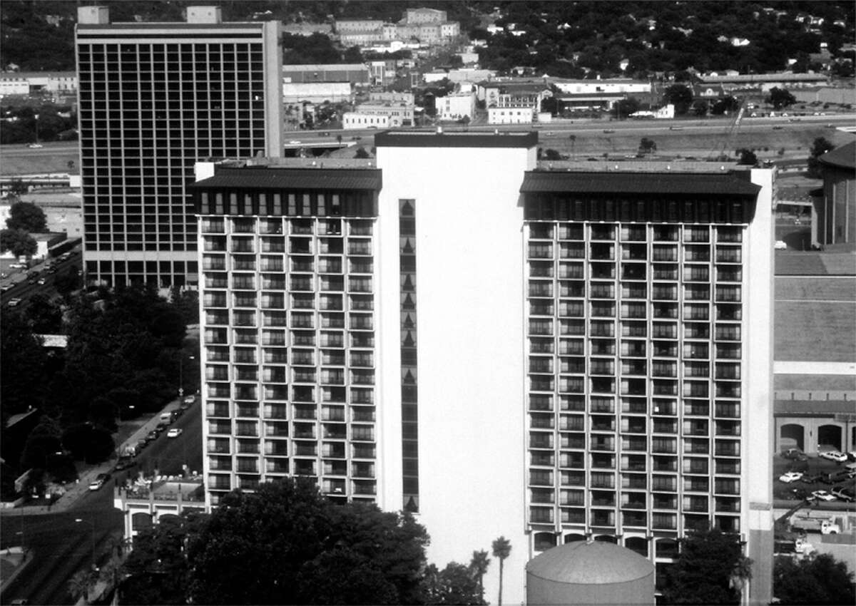 FOCUS 99 #2 / features / Kris Paledes - This is a 1988 file photo of the Hilton Palacio Del Rio (foreground, center) with the Mariott Hotel in the backgournd. FILE / SLIDE (1988)