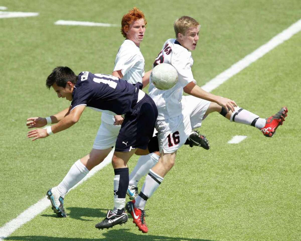 Boerne Champion forward Alejandro Rubio (10) and Kilgore's Brett Forbus (16) collide in the UIL Boys 4A state soccer championship in Georgetown on Saturday April 16, 2011. (Erich Schlegel/Special to the Express-News)