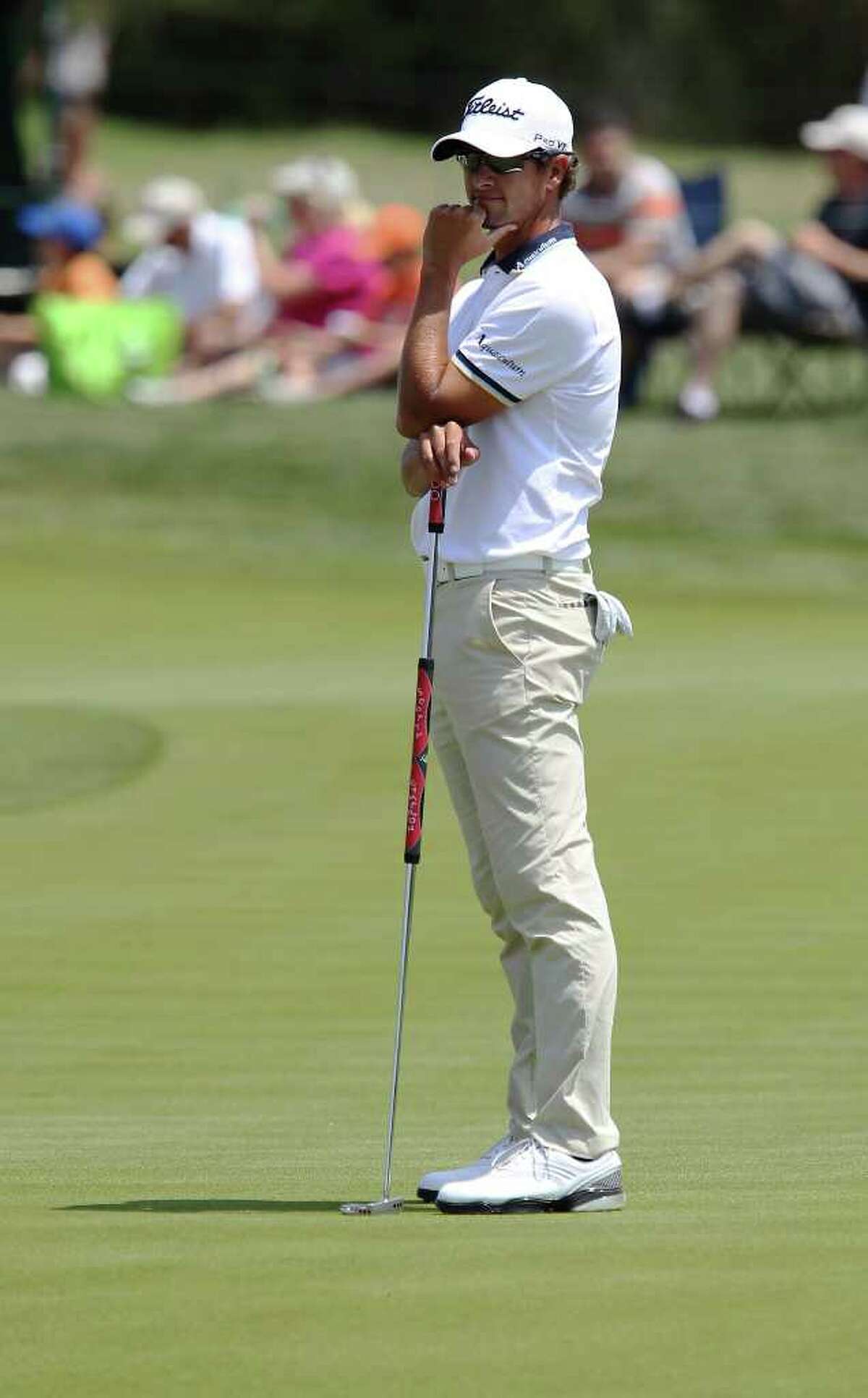2010 champion Adam Scott ponders a missed putt on No. 7 during the final round at the 2011 Valero Texas Open at the AT&T Oaks Course at TPC San Antonio on Saturday, April 16, 2011. Scott finished 23rd. Kin Man Hui/kmhui@express-news.net