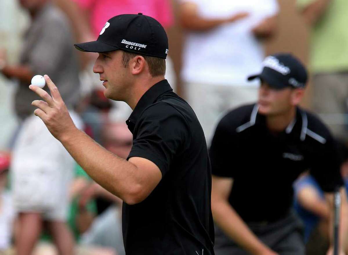 Kevin Chappell acknowledges the crowd after his par putt on No. 16 in the final round at the 2011 Valero Texas Open at the AT&T Oaks Course at TPC San Antonio on Saturday, April 16, 2011. Chappell finished tied for second place. Kin Man Hui/kmhui@express-news.net