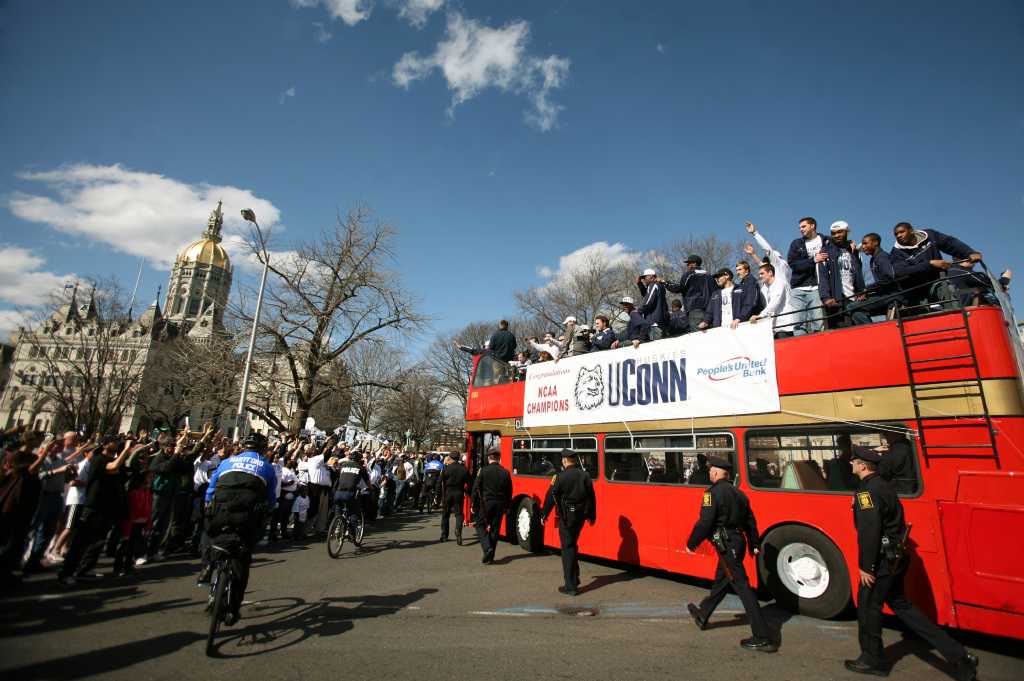 Thousands celebrate UConn men at victory parade, rally