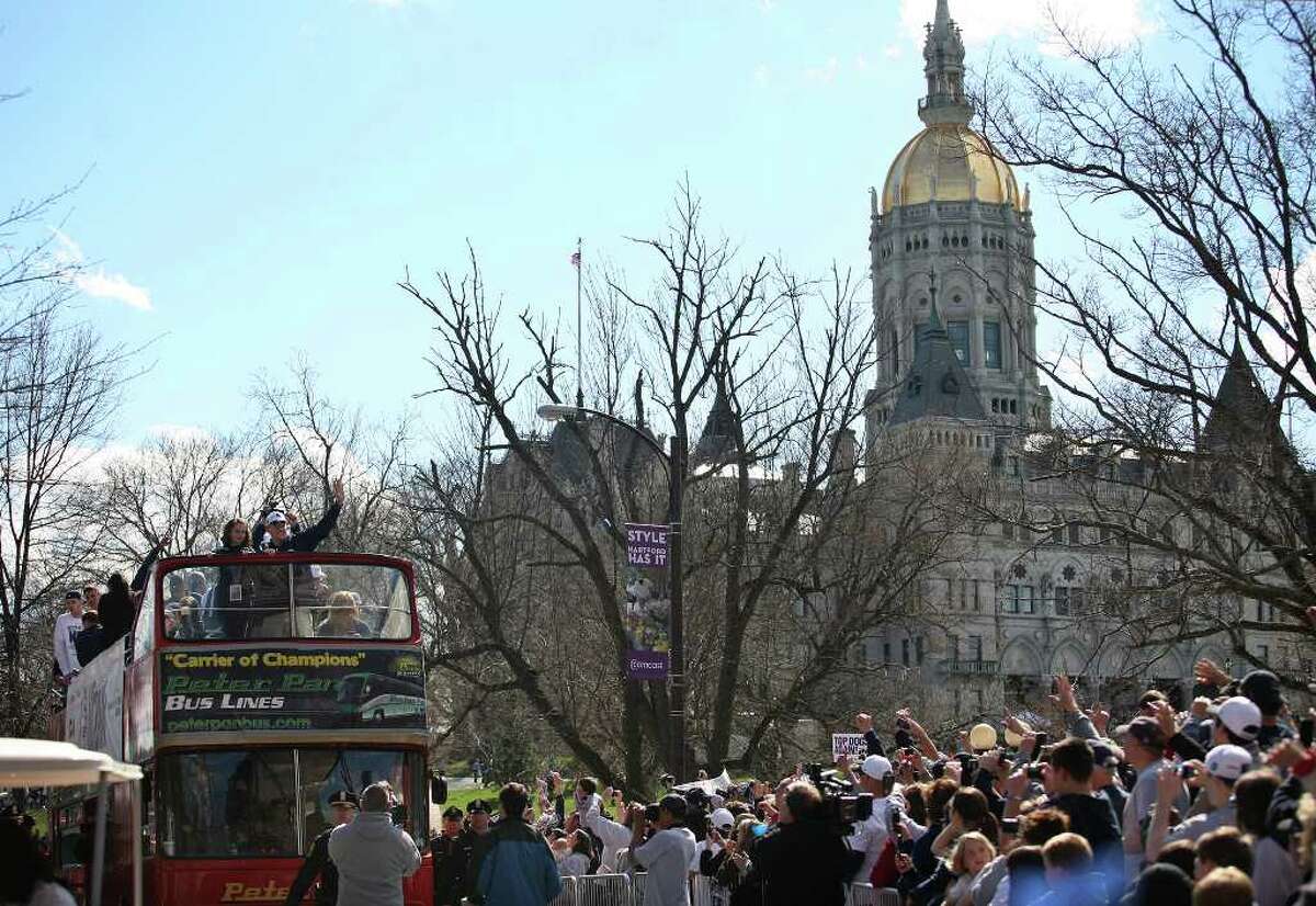 Thousands celebrate UConn men at victory parade, rally