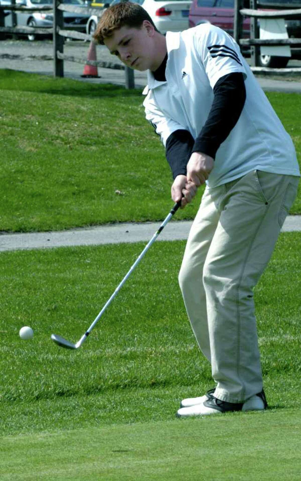 SPECTRUM/Nick Jiminez works on his short game in preparation of the New Milford High School golf season. April 8, 2011