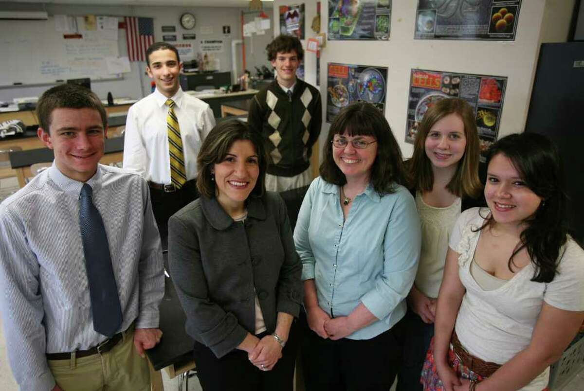 A team of Shelton High School students designed a cellular biology experiment that will be included in the Space Shuttle Endeavor mission on April 29. From left; Jame Szabo, 18, Omar Sobh, 17, Assistant Director for STEM education Tina Henckel, Jason Shnipes, 18, Teacher Mary Clark, Leann Misencik, 17, and Jessica Olavarria, 16.