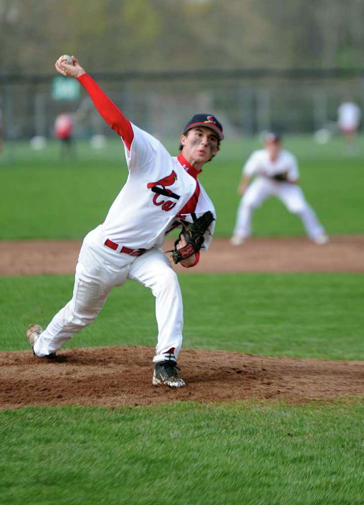 Greenwich pitcher Dylan Callahan throws the ball during Wednesday's game against Danbury at Greenwich High School on April 20, 2011.