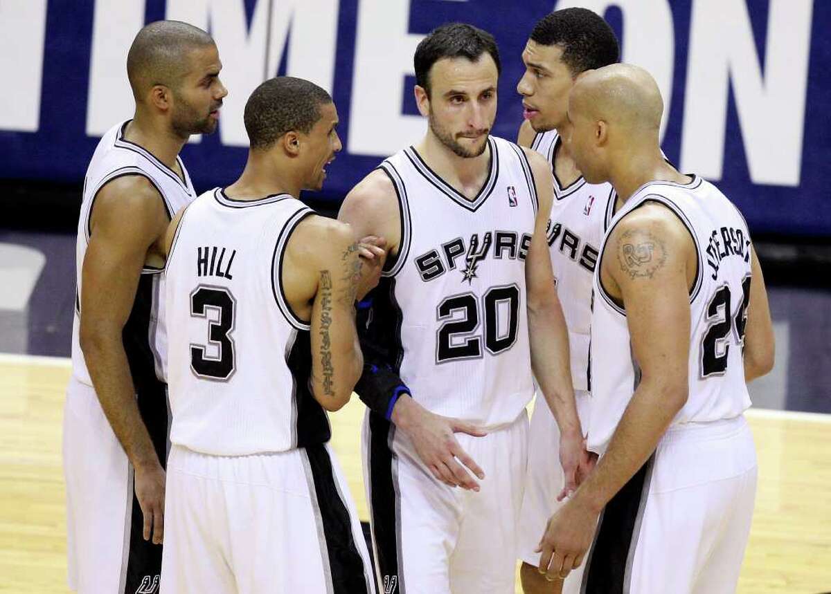 FOR SPORTS - San Antonio Spurs' Tony Parker, George Hill, Manu Ginobili, Danny Green, and Richard Jefferson talk late in Game 2 of the first round of the Western Conference playoffs against the Memphis Grizzlies at the AT&T Center Wednesday April 20, 2011. The Spurs won 93-87.(PHOTO BY EDWARD A. ORNELAS/eaornelas@express-news.net)
