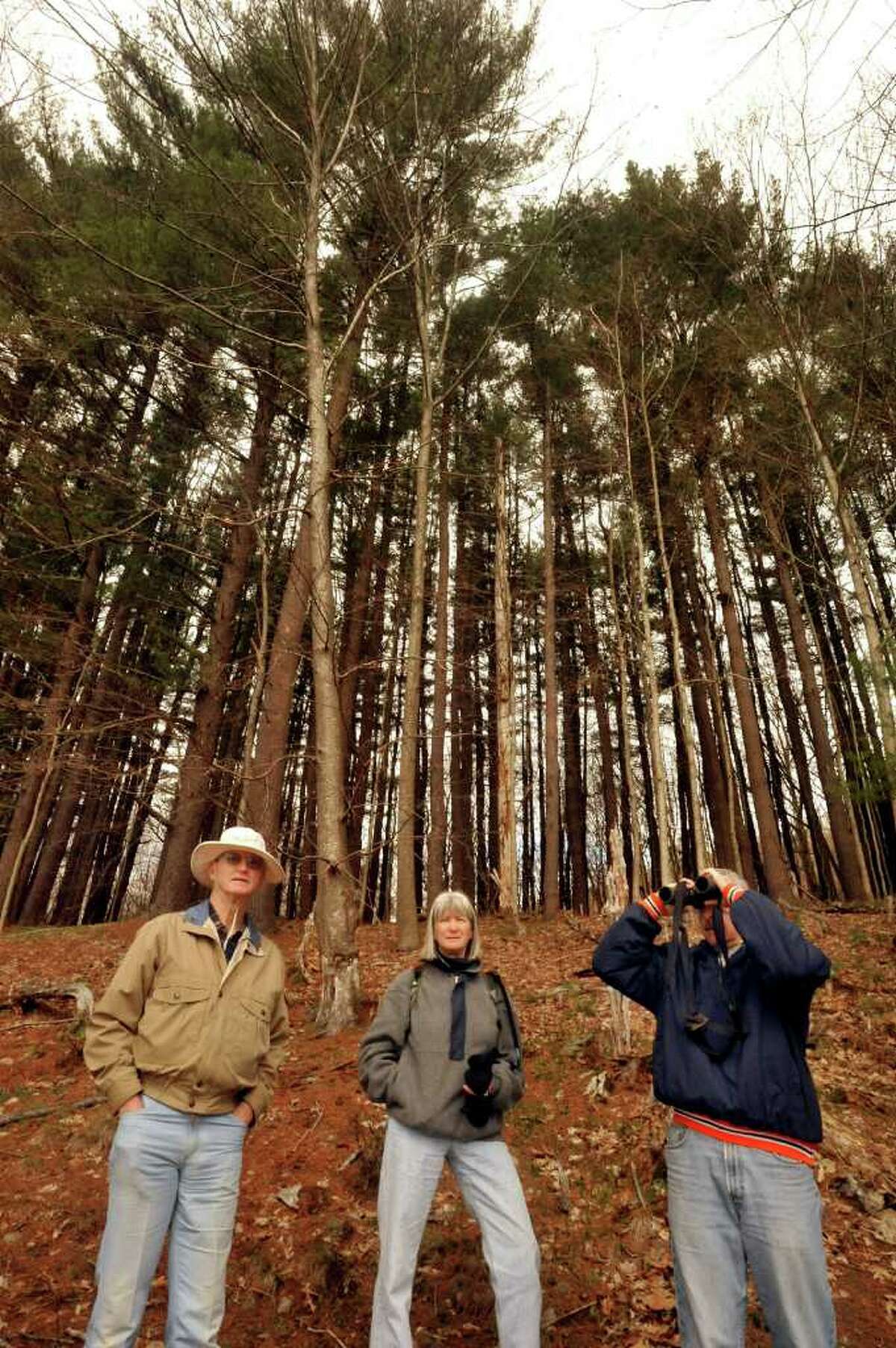 Bill Montgomery, left, Melanie Sim, and Nick Kaplanis, director of recreation, look over the Farrington property, consisting of 192-acres, that Danbury acquired last year. Photographed Thursday, April 21, 2011.