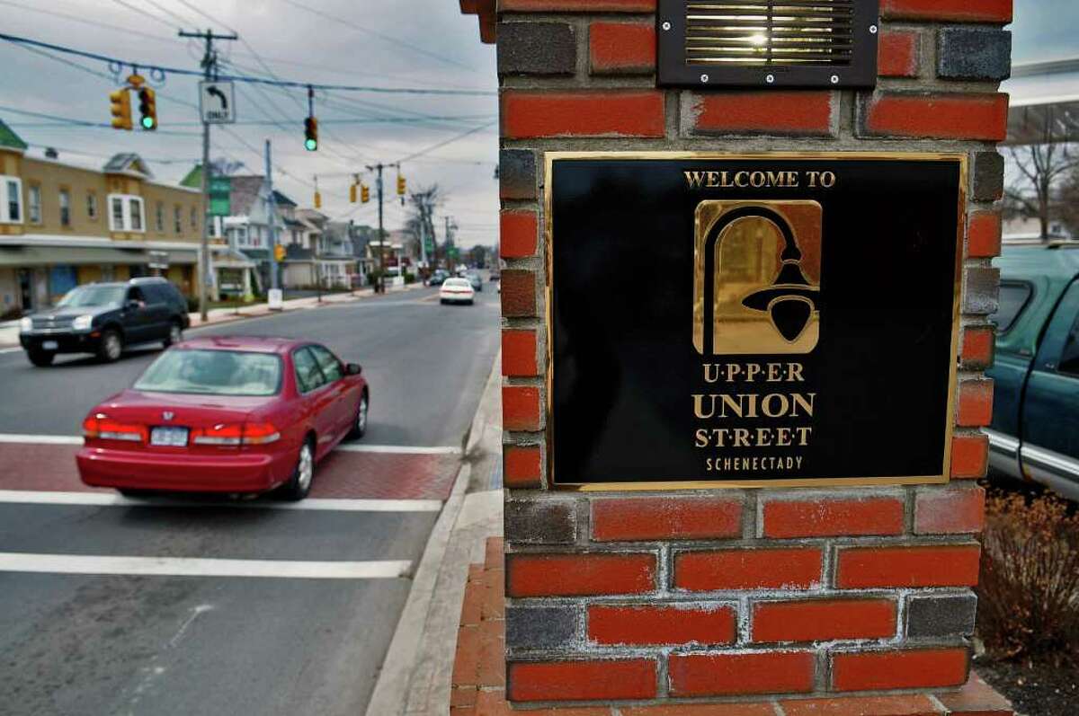 The Upper Union Street area of Schenectady includes quiet residential streets that lead to a thriving commercial strip. In a recent National Association of Realtors survey, a majority of Americans said they would prefer to live in neighborhoods where they can walk to stores. (Philip Kamrass / Times Union)