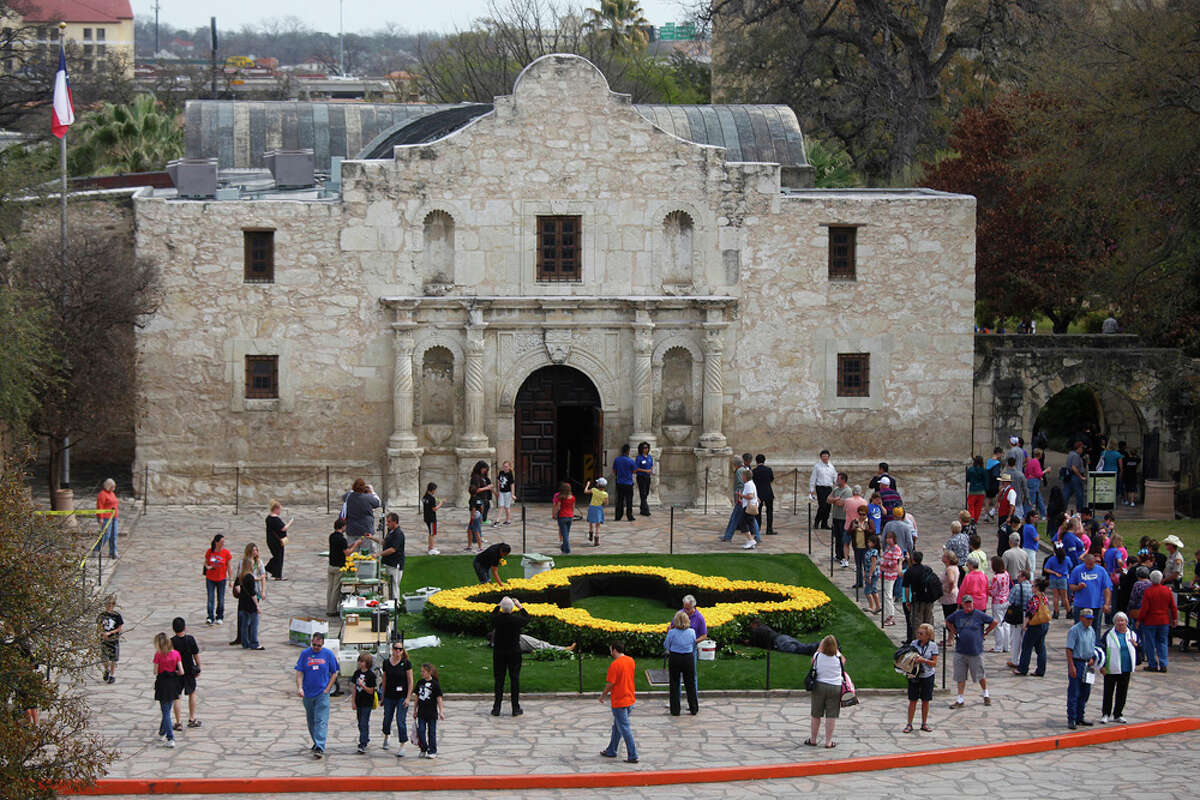 The Roses of Remembrance wreath adorns the lawn of the Alamo. LISA KRANTZ / EXPRESS-NEWS