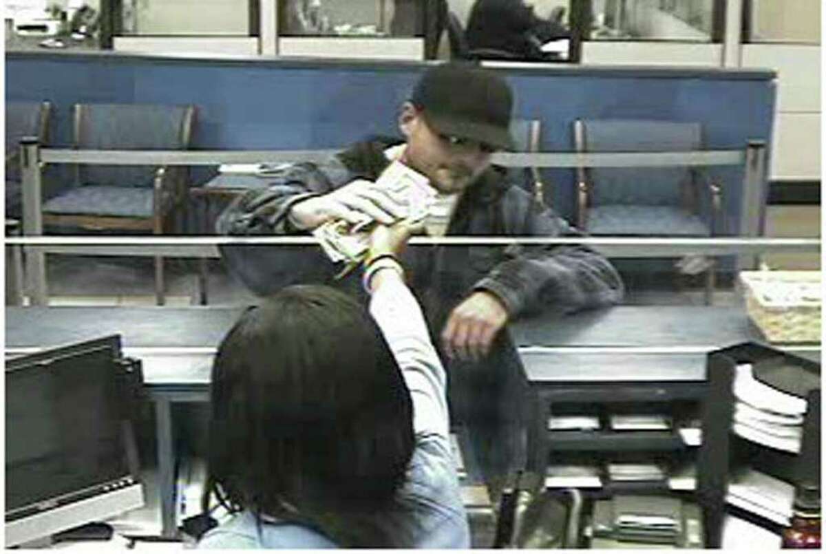 Surveillance photo of the man Newtown Police said robbed the Chase Bank on Church Hill Road Monday afternoon.