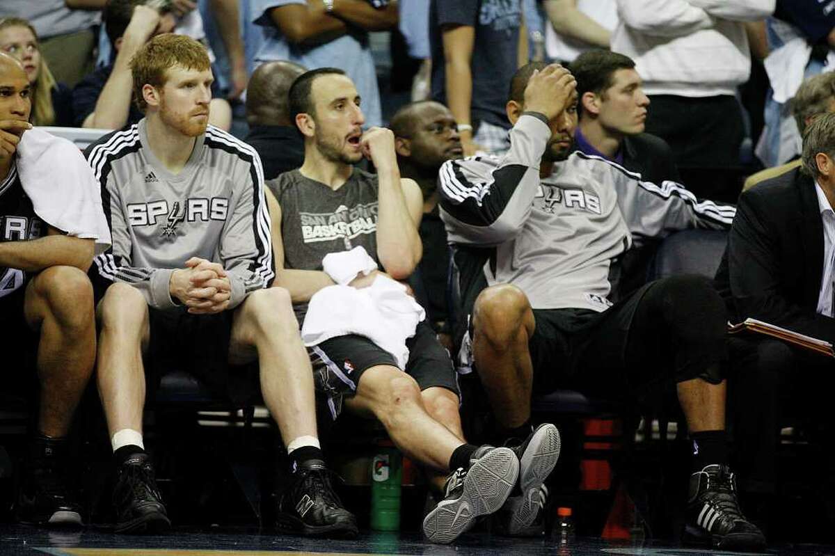 Spurs Matt Bonner, Manu Ginobili and Tim Duncan sit out the last part of the fourth quarter as they lose to the Memphis Grizzlies, 104-86 in game four of the Western Conference First Round at FedExForum in Memphis, TN, Monday, April 25, 2011. The Grizzlies lead the series, 3-1. JERRY LARA/glara@express-news.net
