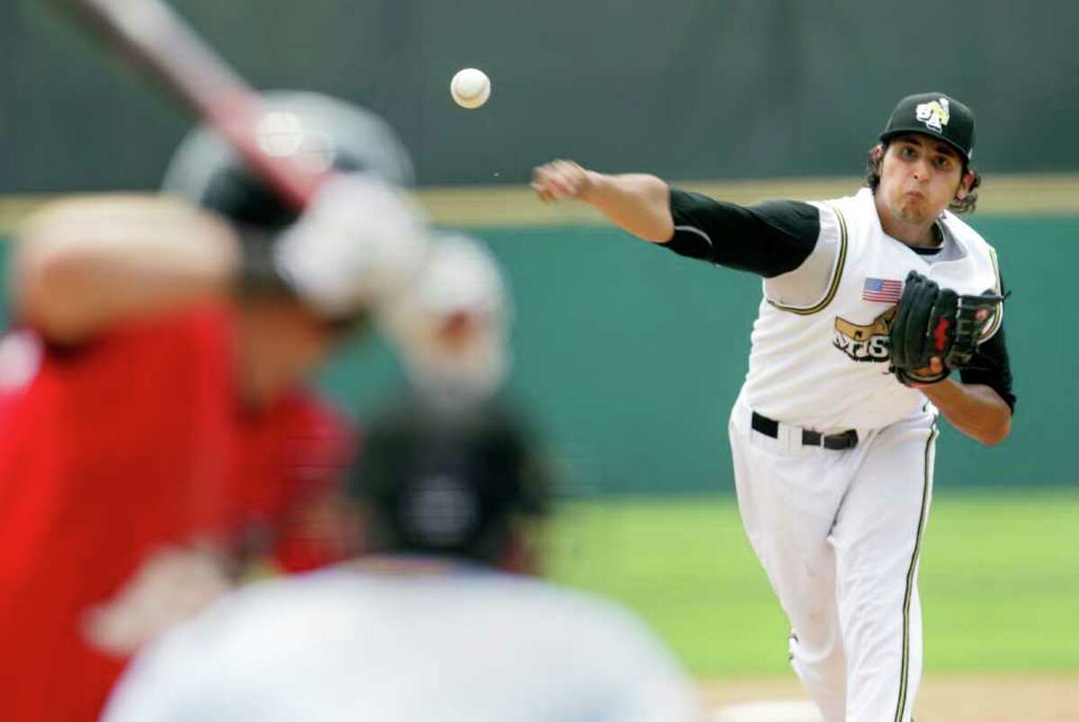 Sports daily - San Antonio Missions pitcher Jorge Reyes fires a pitch to Frisco RoughRiders Davis Stoneburner in the 5th inning at Wolff Stadium, Tuesday, April 26, 2011. The Missions won 6-5, after a controversial call in the final inning. Photo Bob Owen/rowen@express-news.net