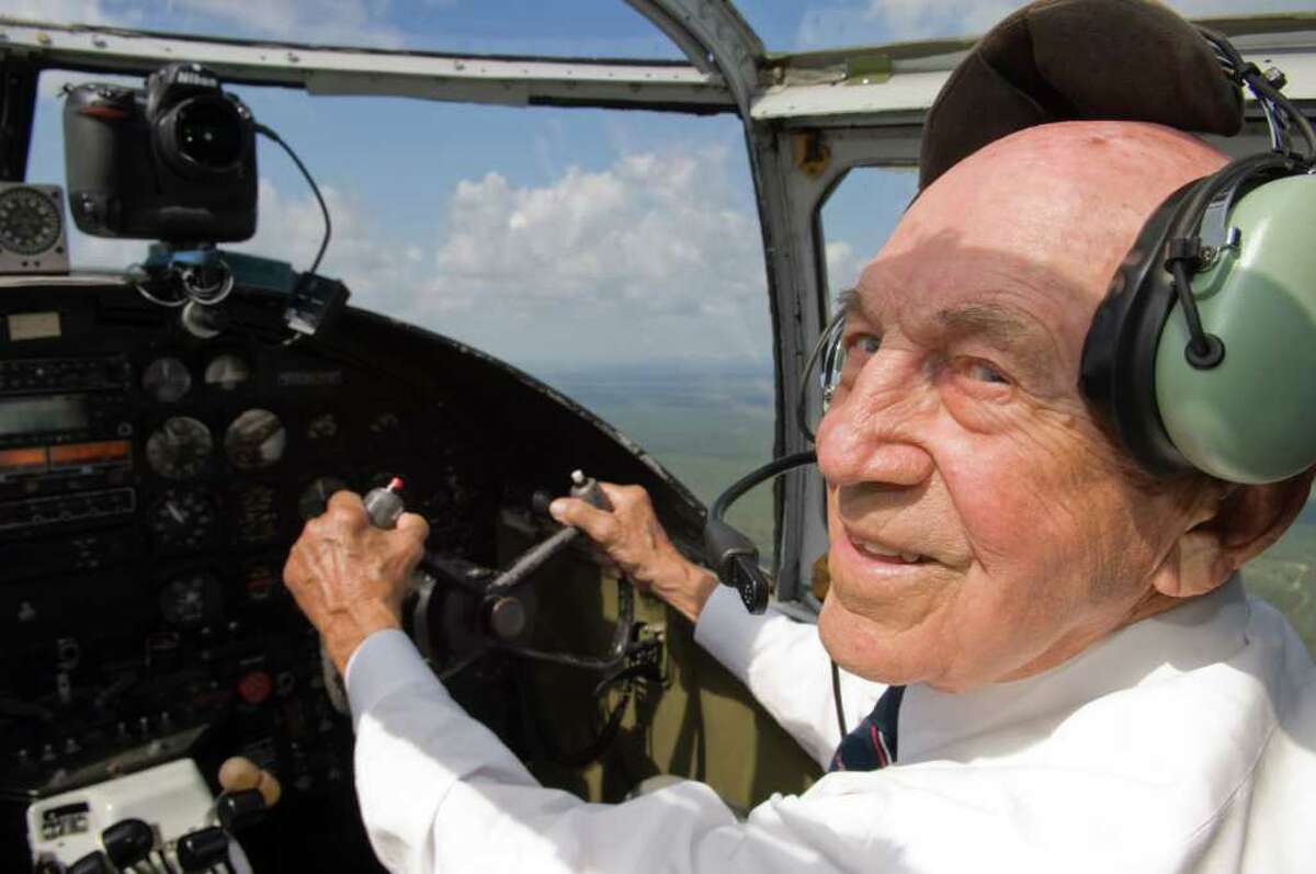 Prior to a Doolittle Raiders training re-enactment in 2008, Robert Cole piloted a B-25 in a holding pattern above Eglin AFB. (U.S. Air Force photo by Lance Cheung)