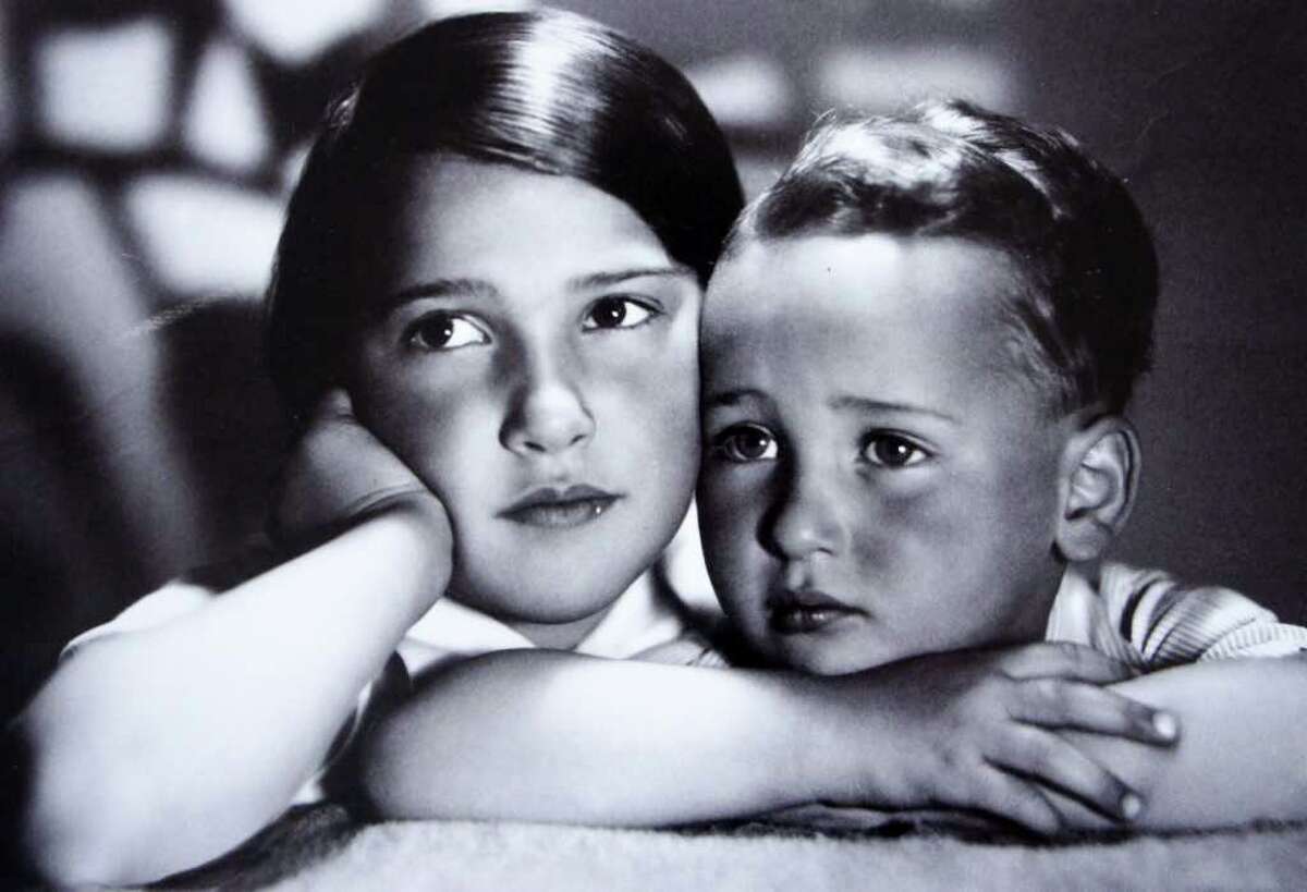In a picture taken circa 1940, Anita Schorr poses with her younger brother, Michael.