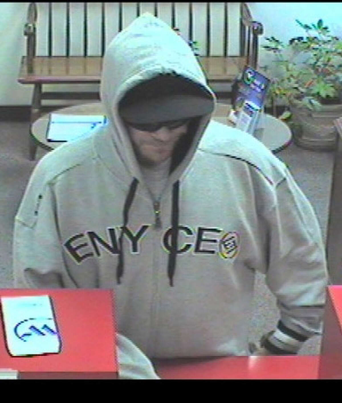 State police name suspect in Sherman bank robbery