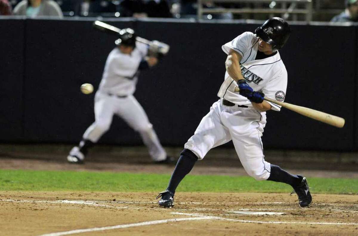 Adam Greenberg swings at a ball during Friday's Bluefish game at the Ballpark at Harbor Yard in Bridgeport on April 29, 2011.