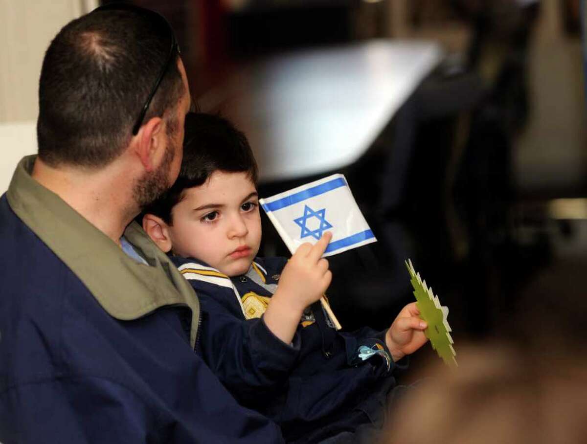 Linus Abrams with his son Alexander, 4, of Old Greenwich, at the Hebrew Wizards "virtual Israel" to celebrate Israels's 63rd birthday at the Boys & Girls Club of Greenwich on Sunday, May 1, 2011.
