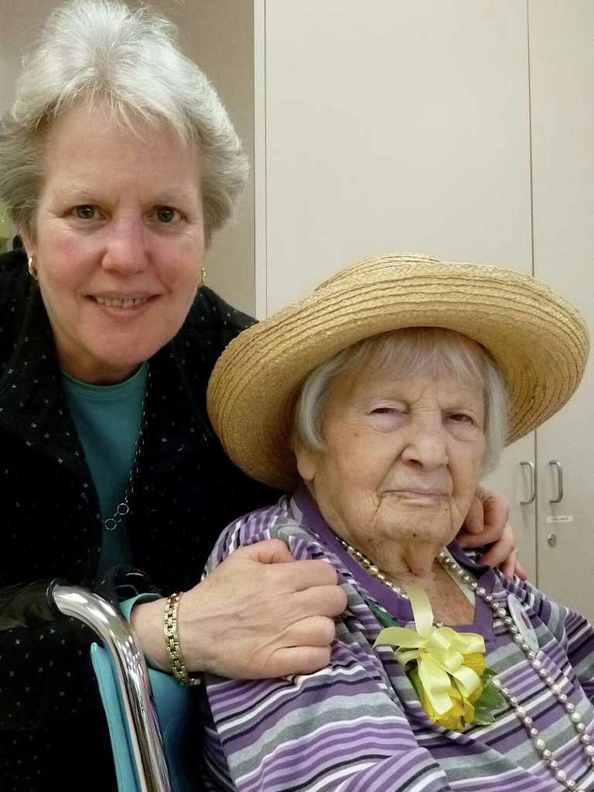 Phyllis Weisberg with her mother Freda Hertz, 100, at a Sunday centenarian party at the Jewish Home for the Elderly.