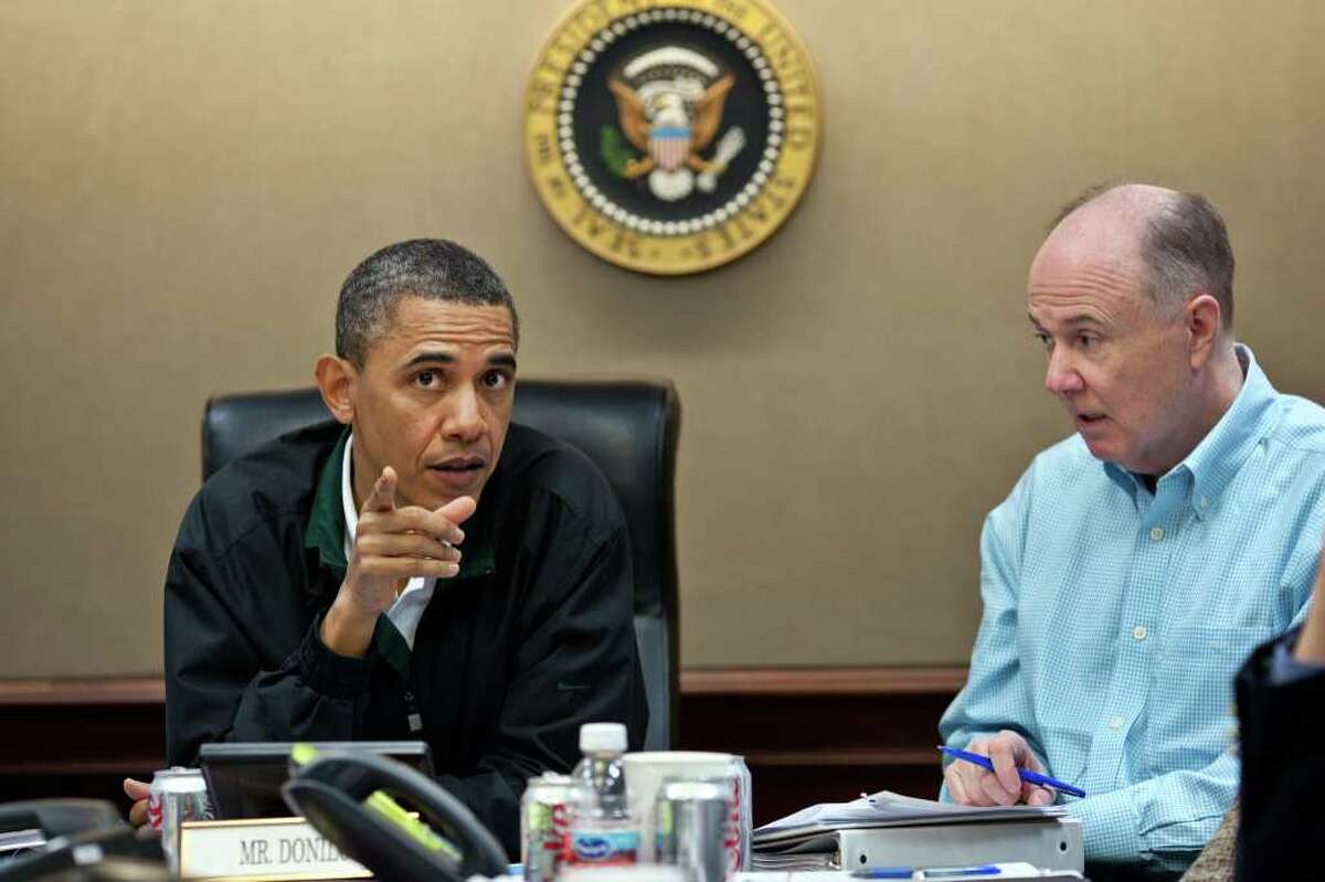 In this image released by the White House, President Barack Obama makes a point during one in a series of meetings in the Situation Room of the White House discussing the mission against Osama bin Laden, Sunday, May 1, 2011. National Security Adviser Tom Donilon is pictured at right.