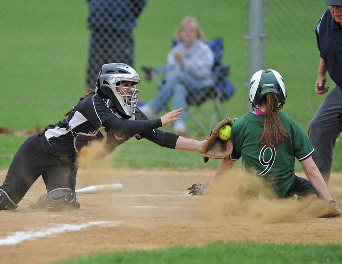 Bethlehem catcher Sammy Smaldone tags out Shenendehowa's Melissa Morgan at home plate during a softball game in Clifton Park, N.Y. Monday May 2, 2011. (Lori Van Buren / Times Union)