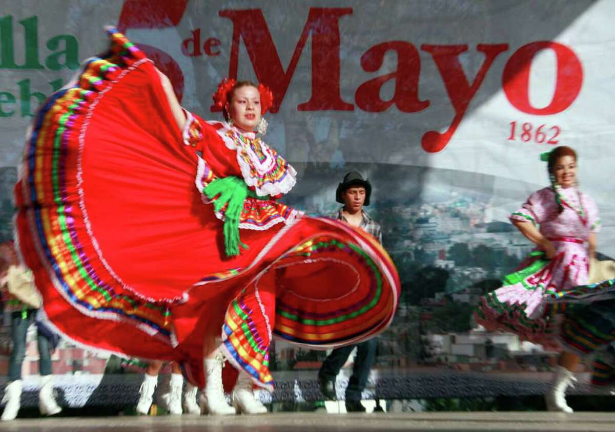 Marylin Castillo dances in Los Angeles Thursday, May 5, 2011, in honor of the Cinco de Mayo celebration.